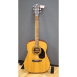 A Cort acoustic guitar