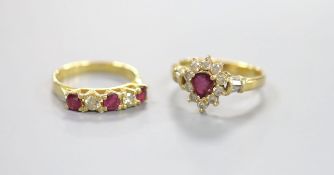 Two modern 18k, ruby and diamond dress rings, including pear shaped cluster and half hoop, sizes