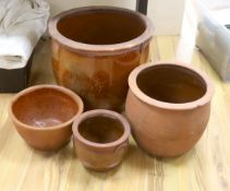 Four Sussex terracotta pots, tallest 40cm