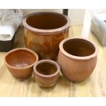 Four Sussex terracotta pots, tallest 40cm