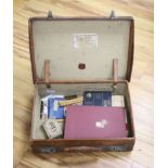 Cigar ephemera and mixed collectables in a leather suitcase