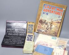 A collection of stamps, coins, banknotes, football programmes from 1942, playing cards and a book.