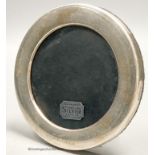 A modern silver mounted circular photograph frame, engraved 'Concorde', Carr's of Sheffield,