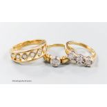 Three assorted modern 9ct gold and diamond set dress rings, including illusion set three stone and