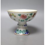 A 19th century Chinese famille stem cup, 12cm diameter