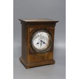 An Edwardian walnut mantel clock, with decorative dial, height 26cm