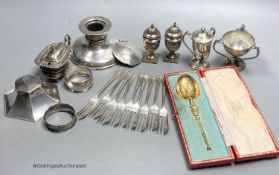 Sundry small silver including cased spoon, two mounted inkwells, two small trophy cups, condiments,