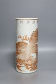 A Chinese cylindrical porcelain vase, painted in iron red, with script, 28cm