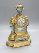 A late 19th century French gilt metal and porcelain mounted mantel clock, Japy freres movement