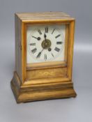 A 19th century walnut cased Black Forest mantel clock, bell striking movement with pendulum, height