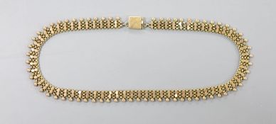 An early 20th century fancy link and bead choker necklace, 42cm,33.1 grams.