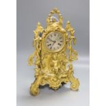 A 19th century French ormolu mantel clock, mounted with an angel, 39cm