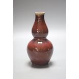 A Chinese flambé double gourd vase, 18cm