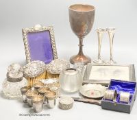 Sundry small silver including a trophy goblet, 22.5cm, napkin rings, two photograph frames, match