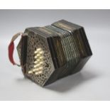 A Victorian 36 button concertina, with pierced nickel mounts, unsigned