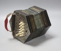 A Victorian 36 button concertina, with pierced nickel mounts, unsigned