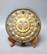 A Tibetan gilt bronze stand, inscribed in sanskrit, 26cm