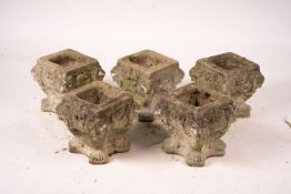 A set of five reconstituted stone lion mask square garden planters, W.30cm H.32cm