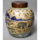 A 19th century Chinese clobbered jar with wood cover24cm