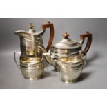 A George V three piece silver oval tea set, London, 1930, together with a similar George III