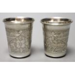 A pair of 19th century Russian engraved 84 zolotnik tots, dated 1879, 48mm, 52 grams.