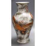 A Chinese enamelled porcelain baluster ‘dragon’ vase,23cm
