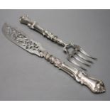 A pair of Victorian pierced silver fish servers, with loaded handles, Hilliard & Thomasson,