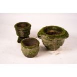 Three weathered reconstituted stone circular garden planters, largest Diam.52cm H.34cm