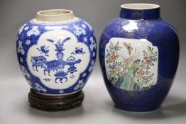 A Chinese Kangxi blue and white hundred antiques jar, 21cm, cracked, with hardwood stand and a