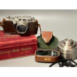 A cased Leica Ernst Leitz Wetzlar nr. 606583 camera together with light meter, lenses etc.