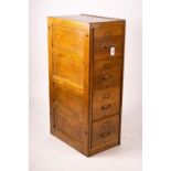An early 20th century oak four drawer filing cabinet, W.44cm D.70cm. H.132cm