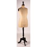 A Stockman tailors dummy on tripod stand, height 164cm