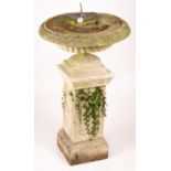 A reconstituted stone garden bird bath combined sundial on square pedestal base, height 108cm