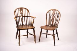 A mid 19th century ash and elm Derbyshire area Windsor elbow chair, together with a 19th century yew