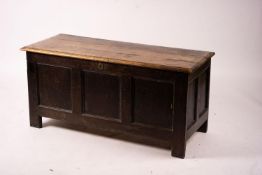 A 17th century panelled oak coffer, length 136cm, depth 56cm, height 64cm