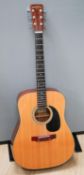 A Suzuki steel string acoustic guitar model???