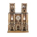 A 19th-century French walnut and ivory model of Notre Dame Cathedralwith carved and pierced