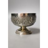 An Indian embossed white metal pedestal bowl, diameter 10.7cm.