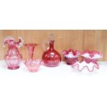 A group of Victorian Cranberry glass dishes, two vases and a Claret jug, tallest 23.5 cm (7)
