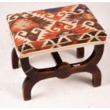 A Victorian beech 'X' framed stool with Kelim seat, length 48cm, depth 35cm, height 37cm