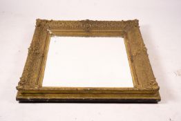 A Victorian gilt gesso wall mirror, W.104cm H.124cm