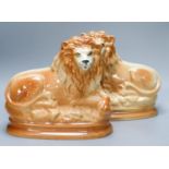 A pair of Staffordshire pottery 'lion' figures30cm