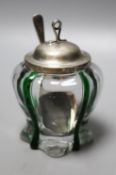A late Victorian Art Nouveau silver mounted green and clear glass preserve pot, the glass probably