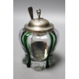 A late Victorian Art Nouveau silver mounted green and clear glass preserve pot, the glass probably