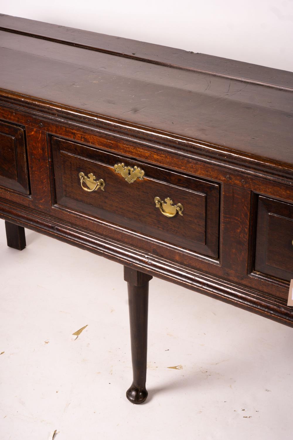 An 18th century oak low dresser on pole turned legs and pad feet, length 198cm, depth 53cm, height - Image 4 of 16