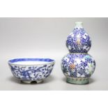 A 19th-century Chinese blue and white dragon bowl and a Chinese enamelled porcelain double gourd
