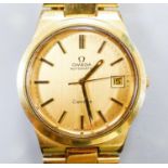 A gentleman's gold plated Omega automatic wristwatch, with date aperture, on a gold plated Omega