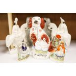 Eight Victorian Staffordshire pottery groups or figures,