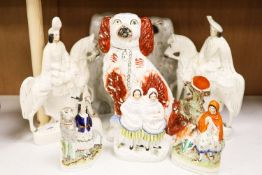 Eight Victorian Staffordshire pottery groups or figures,