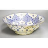 An Iznik style blue and white bowl30cm